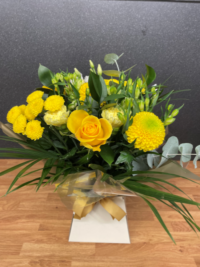 Pocketful of Sunshine - Brighten someone's day with 'Pocketful of Sunshine' from R C Ferguson Florist. This vibrant arrangement radiates joy with its lively yellows and greens, perfect for bringing cheer to any occasion in Dunfermline.
