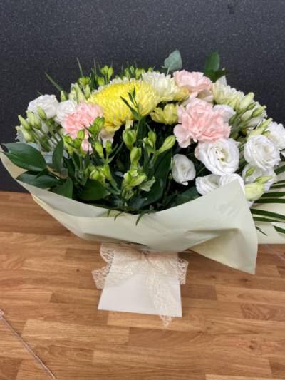 Peach Glow - Introducing 'Peach Glow' by R C Ferguson Florist, Dunfermline. This vibrant bouquet features soft pinks, creamy whites, and sunny yellows, perfect for brightening any occasion. An ideal gift for those who adore elegance and charm.